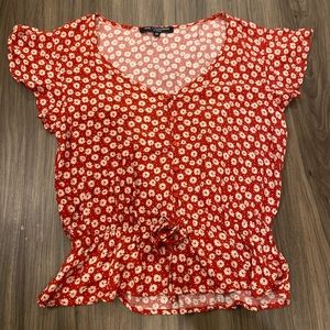 Red floral blouse